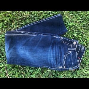 Women’s silver jeans.